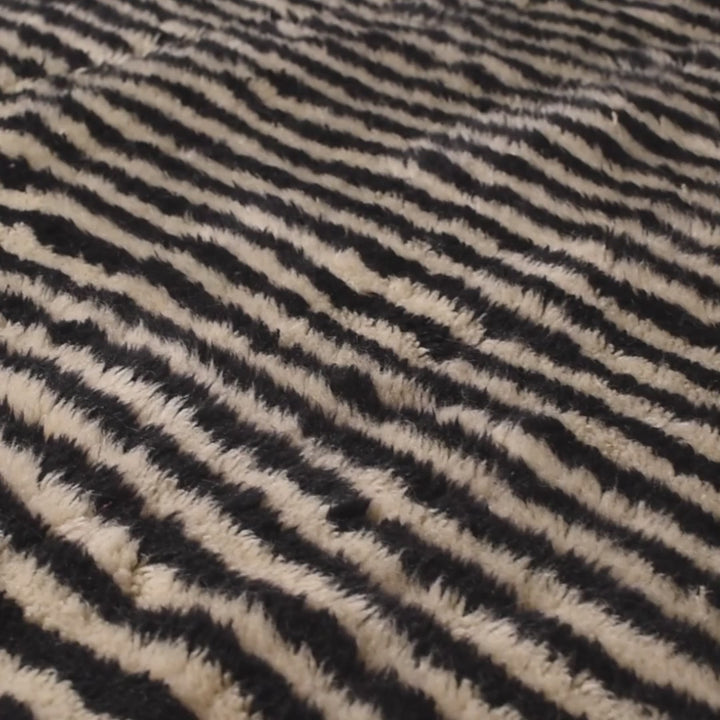 Black and ivory stripe Moroccan wool rug with dynamic design, perfect for modern interiors. Available for sale on Etsy. Ideal as Moroccan runner rug.