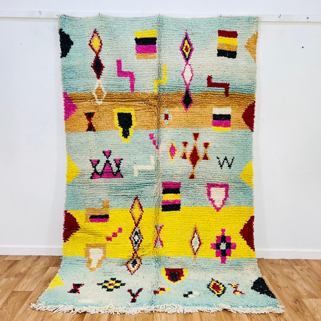 Vintage Moroccan wool rug 684 handmade Berber rug with pink, yellow and multicolor geometric motifs.