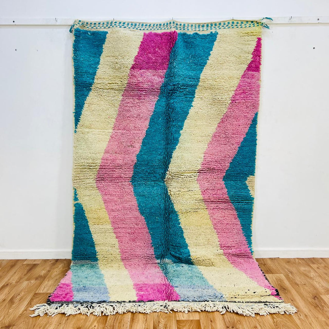 Vintage Moroccan wool rug 701 – handmade chevron design in blue, pink, and cream tones, 253 × 158 cm (8.3 × 5.18 ft).