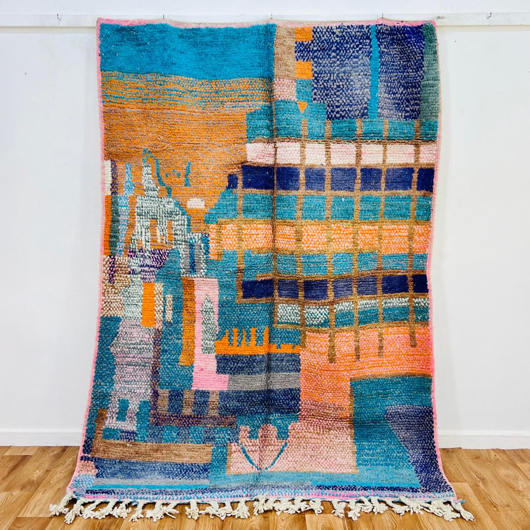 Vintage Moroccan wool rug 655 handmade Berber rug with abstract blue, orange, and pink geometric patterns.