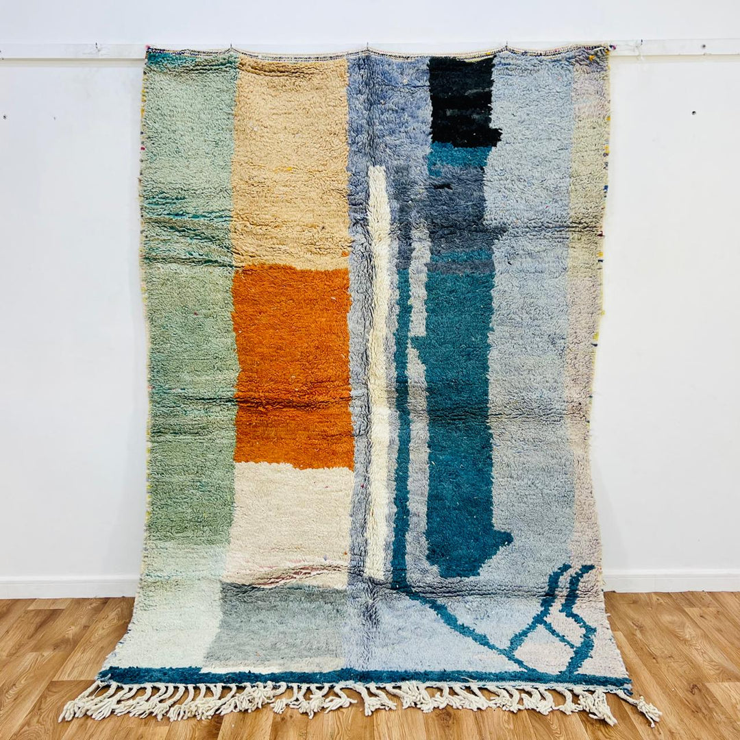 Vintage Moroccan wool rug 717 – handmade abstract blue, teal, and orange geometric design, 235 × 168 cm (7.71 × 5.51 ft).