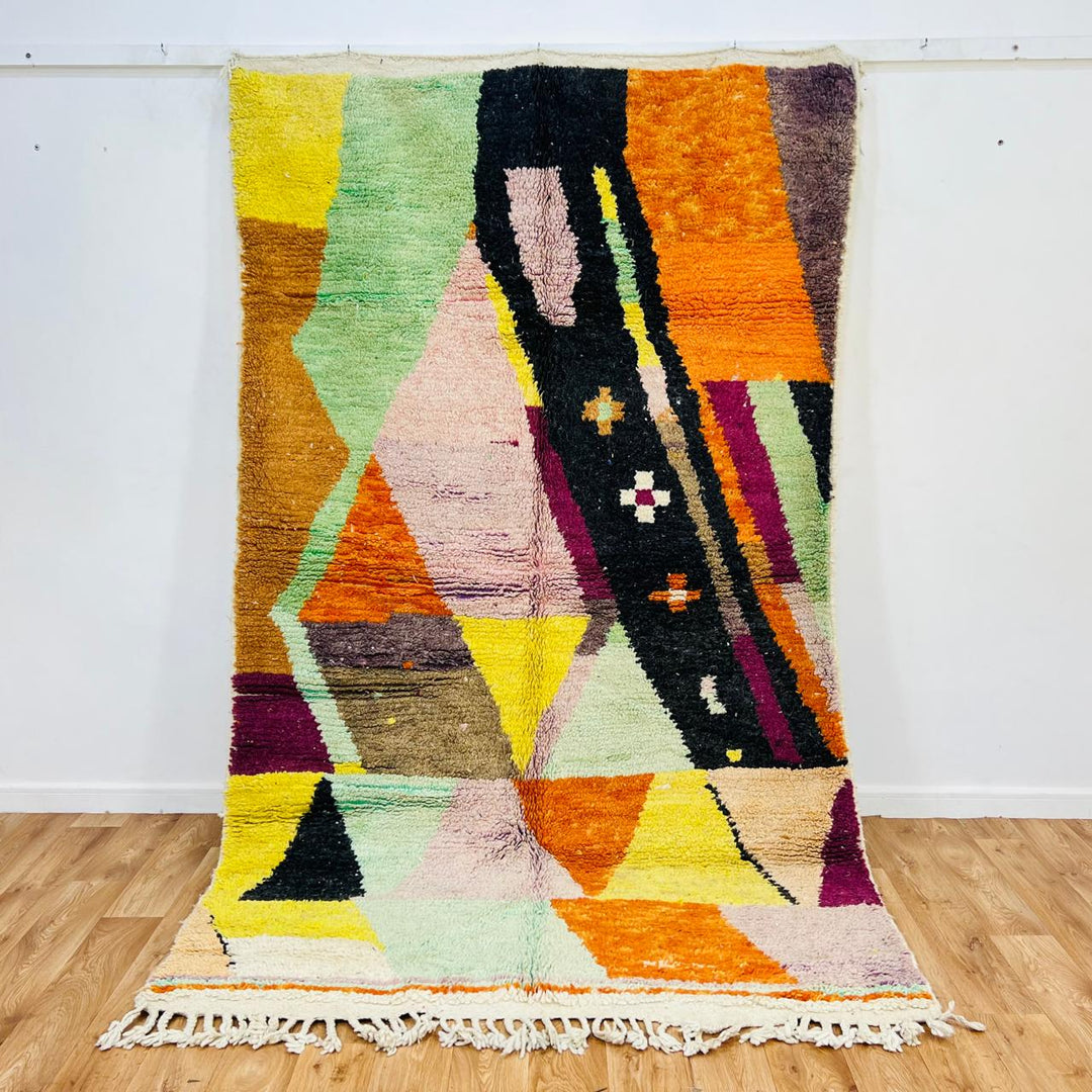 Vintage Moroccan wool rug 682 handmade Berber rug with colorful geometric pattern in pink, yellow, green and black.