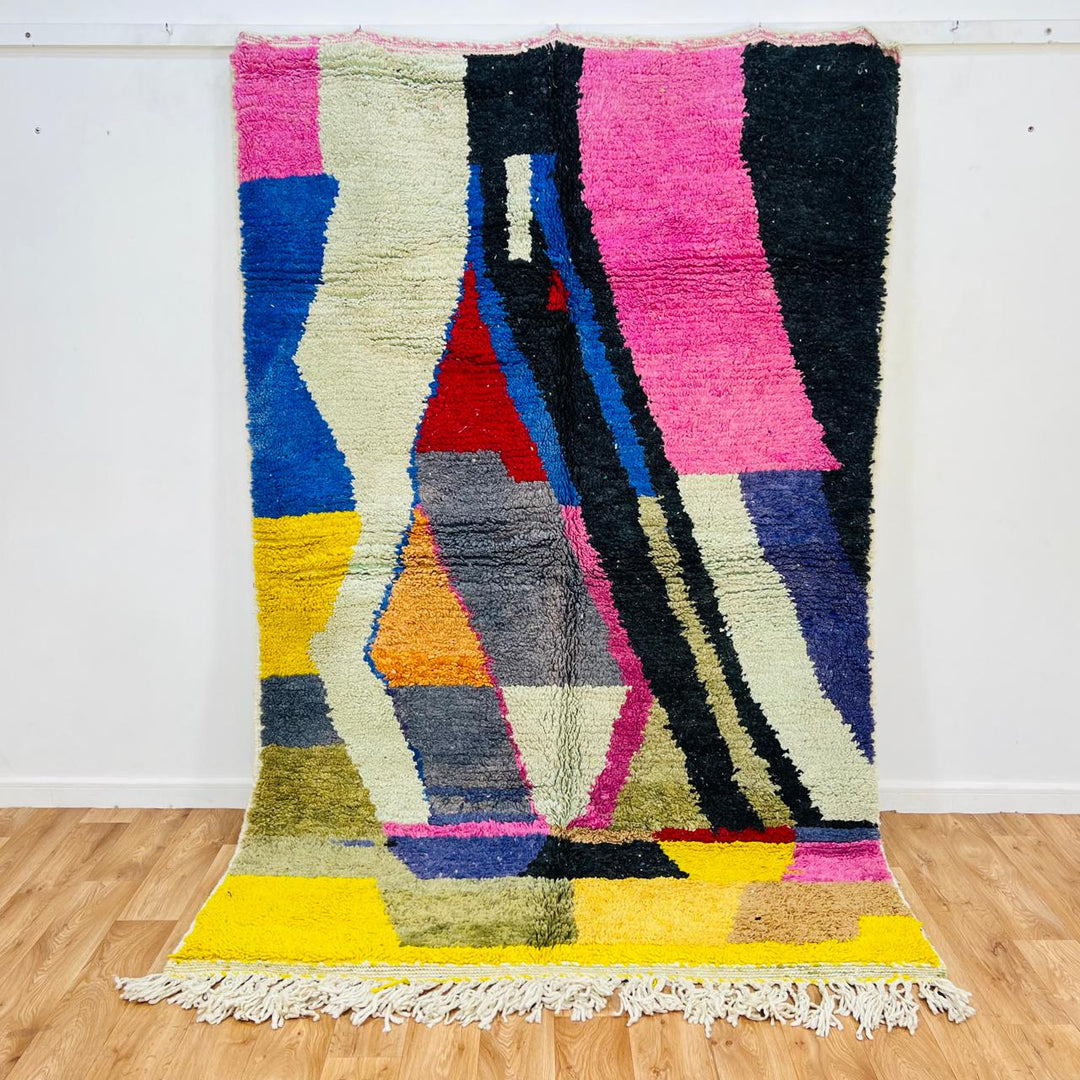 Vintage Moroccan wool rug 668 handmade Berber rug with abstract colorful geometric design in pink, yellow, and blue.
