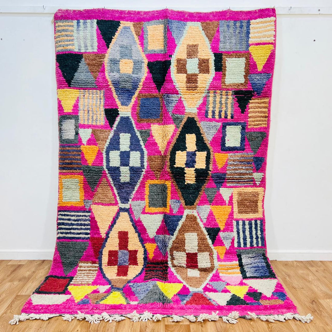 Vintage Moroccan wool rug 650 – handmade colorful geometric design with pink, purple, orange, and cream tones, 257 × 170 cm (8.43 × 5.57 ft).