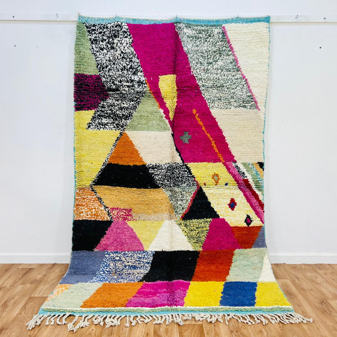 Vintage Moroccan wool rug 627 handmade Berber rug with colorful geometric design in pink, yellow, and orange.