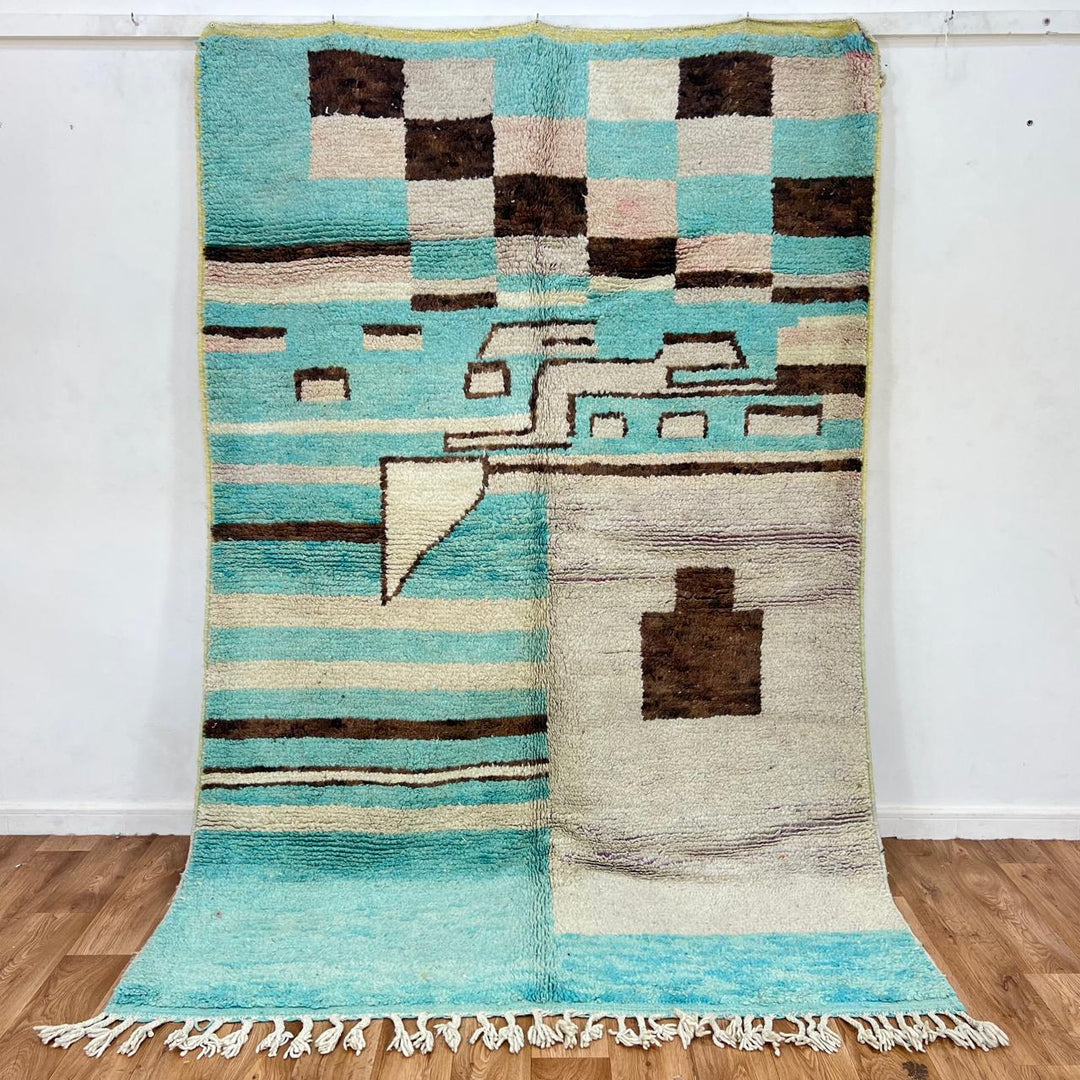 Vintage Moroccan wool rug 748 – handmade aqua blue and cream Berber wool carpet with geometric patterns, 251 × 166 cm (8.23 × 5.44 ft).