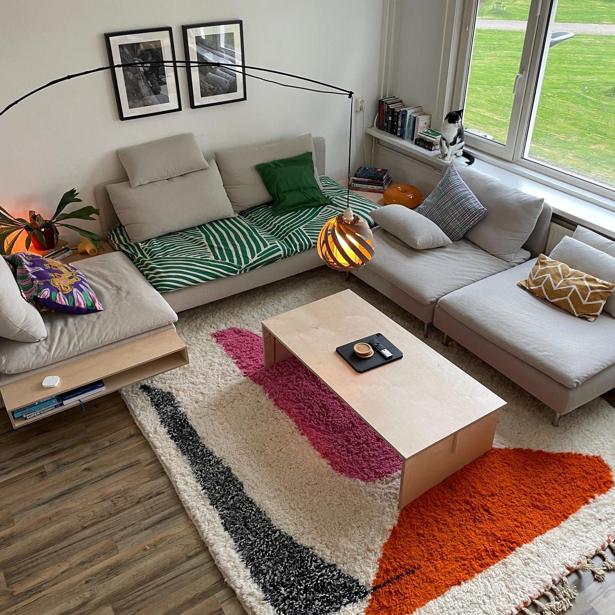 Modern living room styled with a handmade Moroccan Beni Ourain rug, showcasing minimalist furniture and natural textures