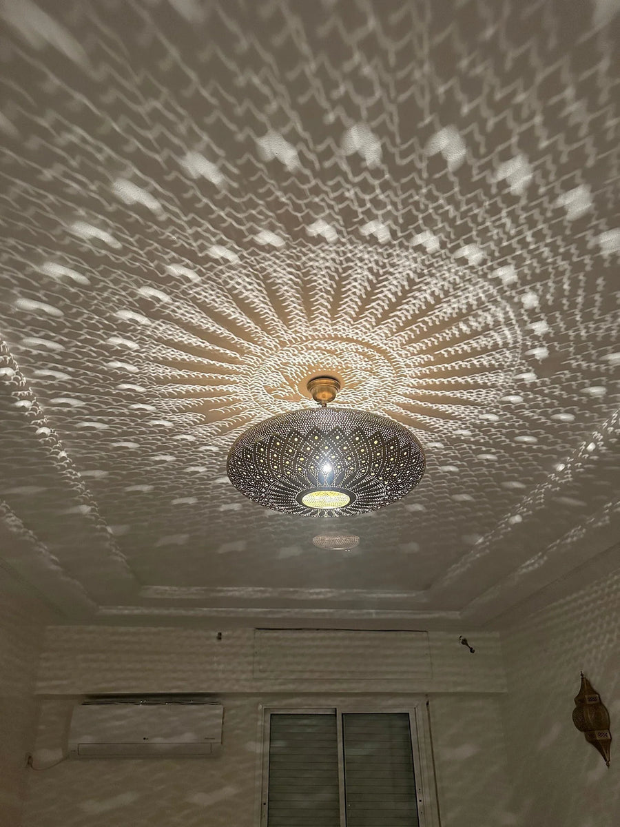 Moroccan Pendant Light – handmade brass lamp by Bohemia Marrakech featuring intricate Moroccan perforations and warm ambient glow