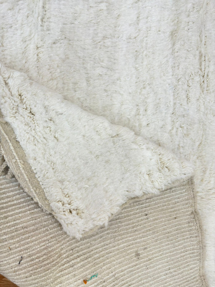 Close-up of a textured white fabric surface