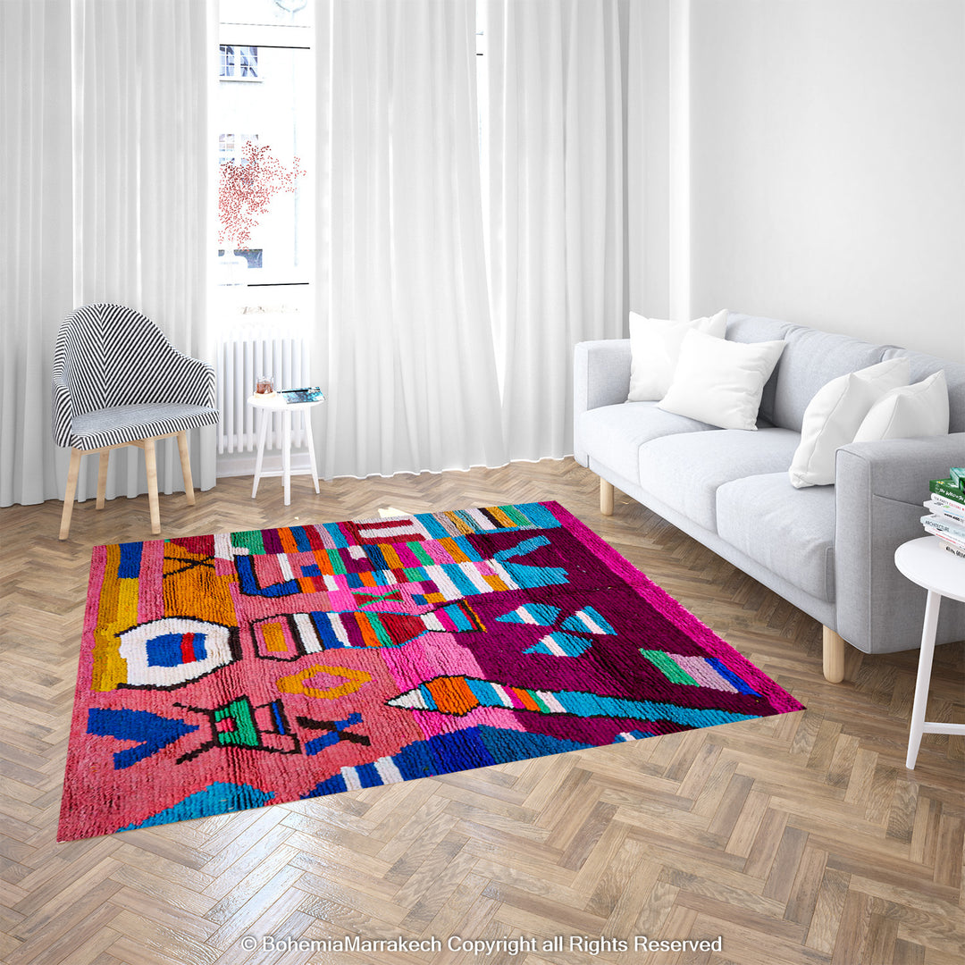 Handmade Moroccan rug with colorful striped and tribal motifs in vibrant wool