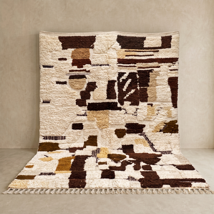 Abstract brown Moroccan Azilal wool rug with earth-tone geometric pattern

