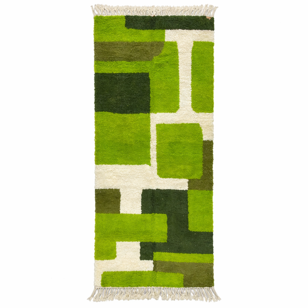 Green abstract Moroccan runner rug with geometric color block design, handmade from wool by Berber artisans.