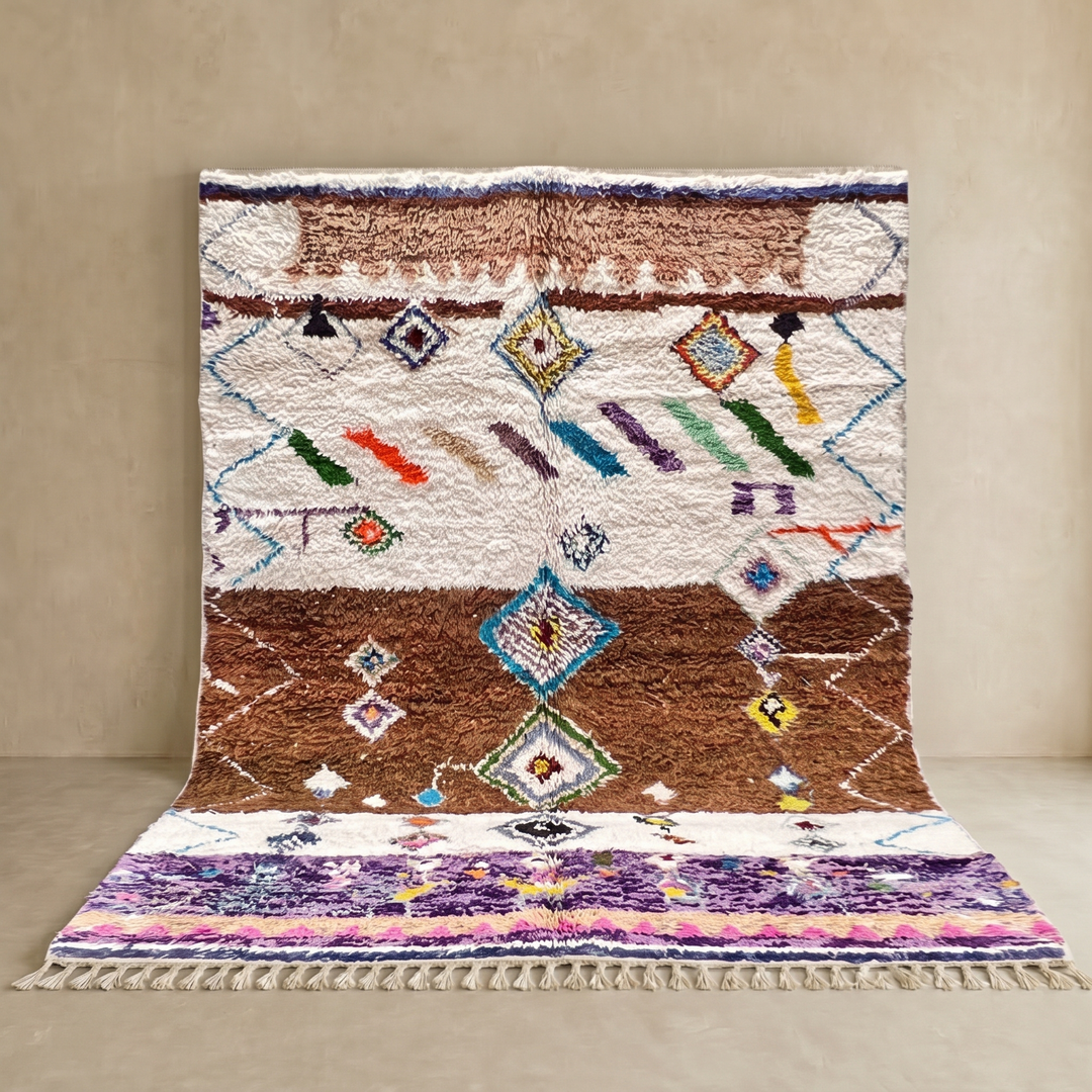 Modern Moroccan wool rug with earth tones and floating diamond pattern
