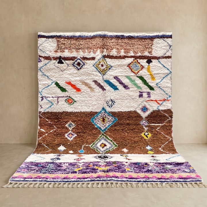 Modern Moroccan wool rug with earth tones and floating diamond pattern
