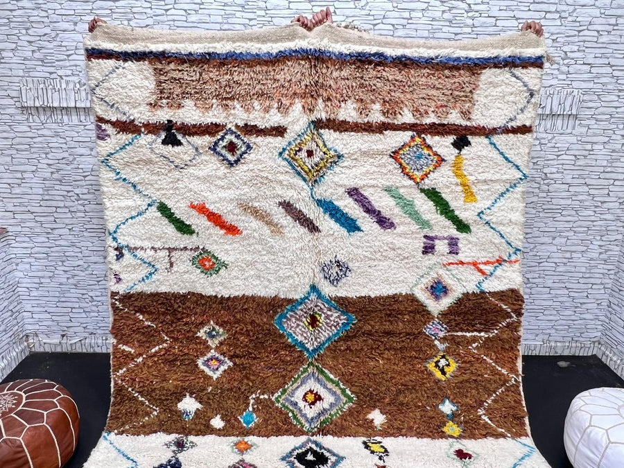 Modern Moroccan wool rug with earth tones and floating diamond pattern