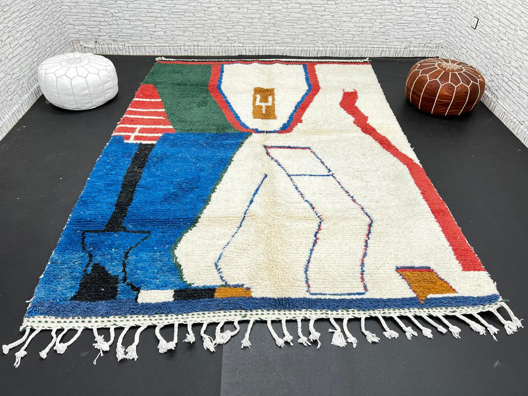 Abstract handmade Moroccan wool rug in green, red, blue, brown, and cream – geometric Berber design