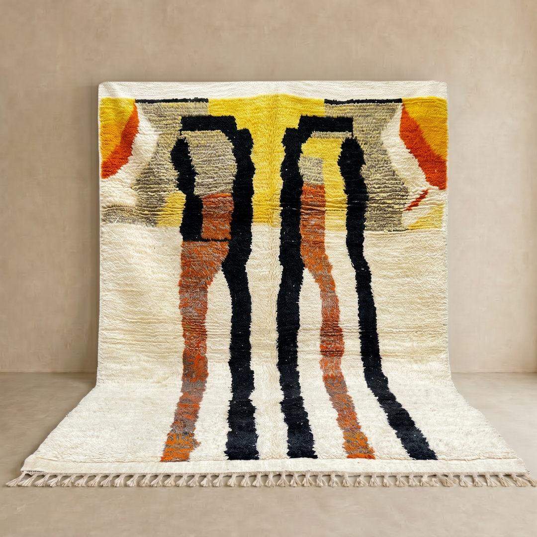 Handmade ivory Moroccan wool rug with orange, black, yellow, and gray abstract stripe patterns – modern Berber rug
