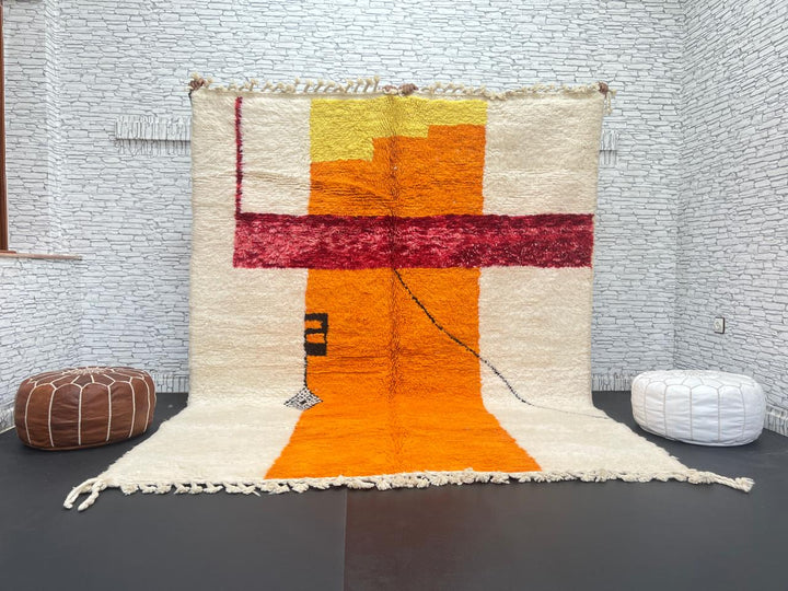 Handwoven abstract Moroccan wool rug with orange, red, and cream geometric design