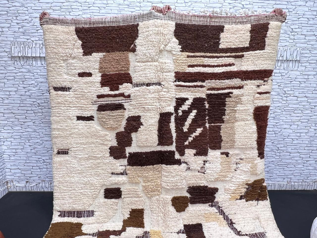 Abstract brown Moroccan Azilal wool rug with earth-tone geometric pattern