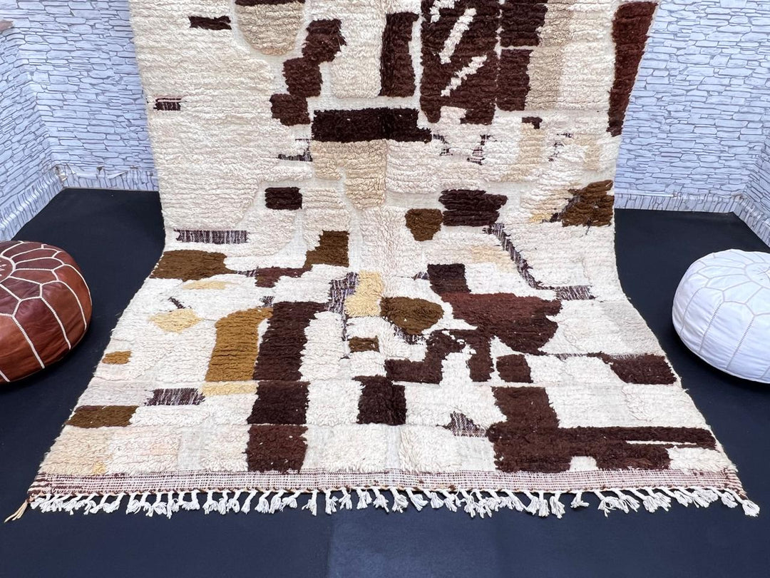 Abstract brown Moroccan Azilal wool rug with earth-tone geometric pattern