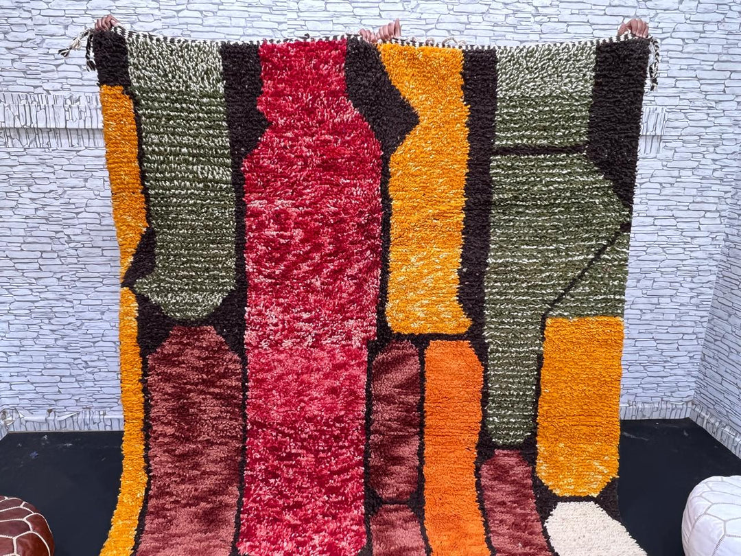 Abstract color block Moroccan wool rug with bold orange, red, green, and purple geometric design