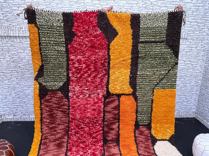 Abstract color block Moroccan wool rug with bold orange, red, green, and purple geometric design