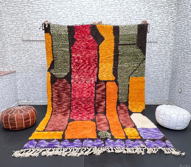Abstract color block Moroccan wool rug with bold orange, red, green, and purple geometric design