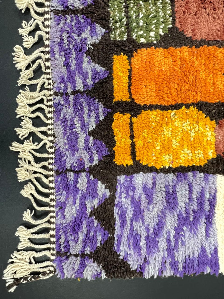 Abstract color block Moroccan wool rug with bold orange, red, green, and purple geometric design