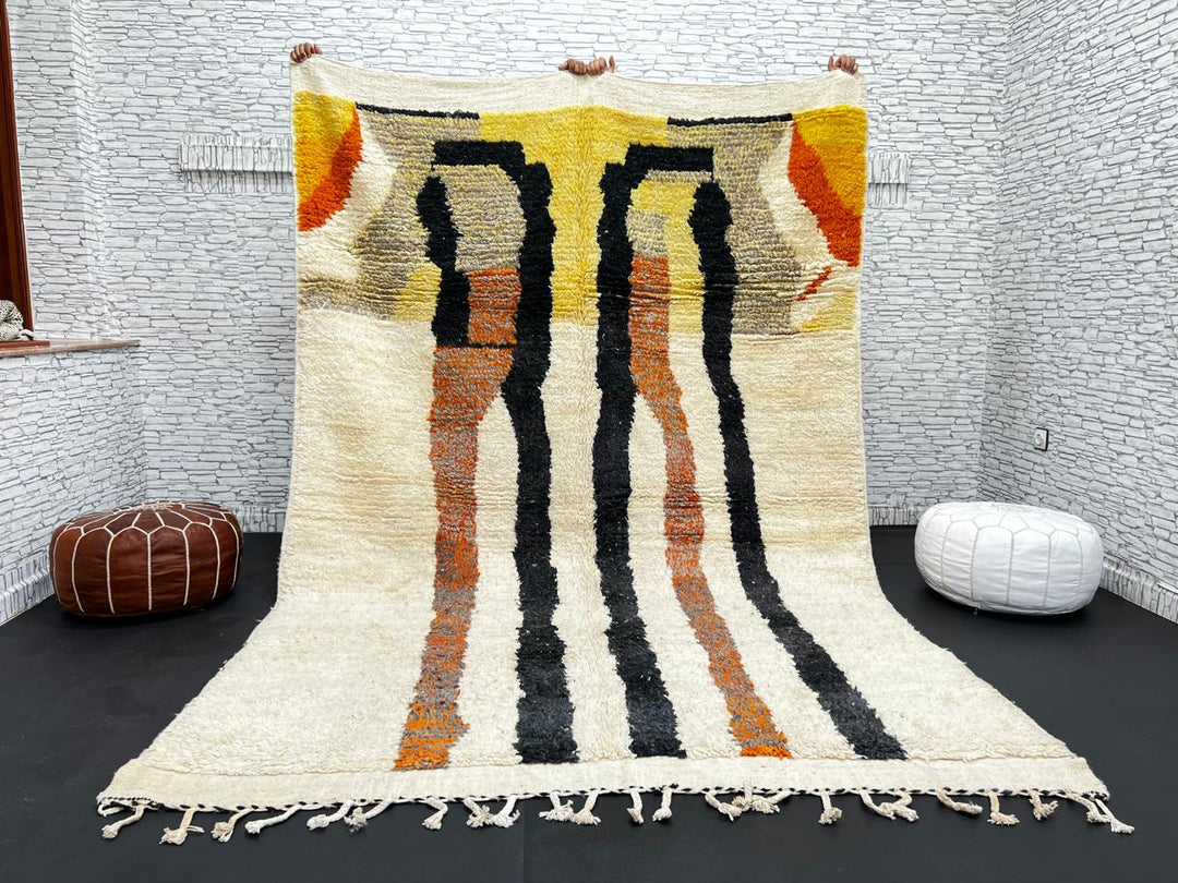 Handmade ivory Moroccan wool rug with orange, black, yellow, and gray abstract stripe patterns – modern Berber rug