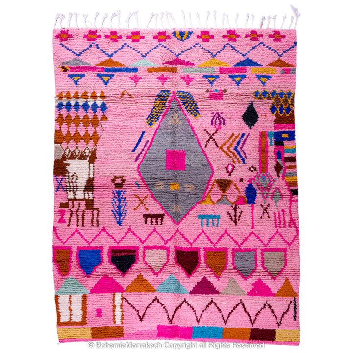 Pink handmade Boujaad Moroccan rug with multicolored tribal symbols and geometric patterns

