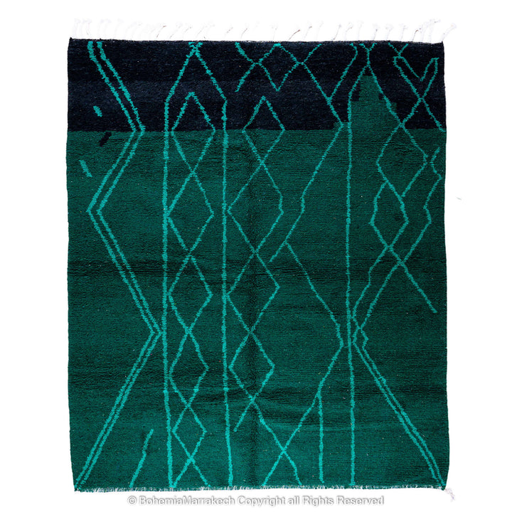 Green Moroccan Boujaad rug with black Berber motifs, handmade in wool by artisans in Morocco