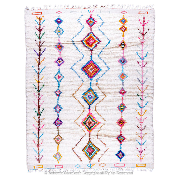 Handmade Beni Ourain Moroccan wool rug with colorful Berber diamonds on a white shag background