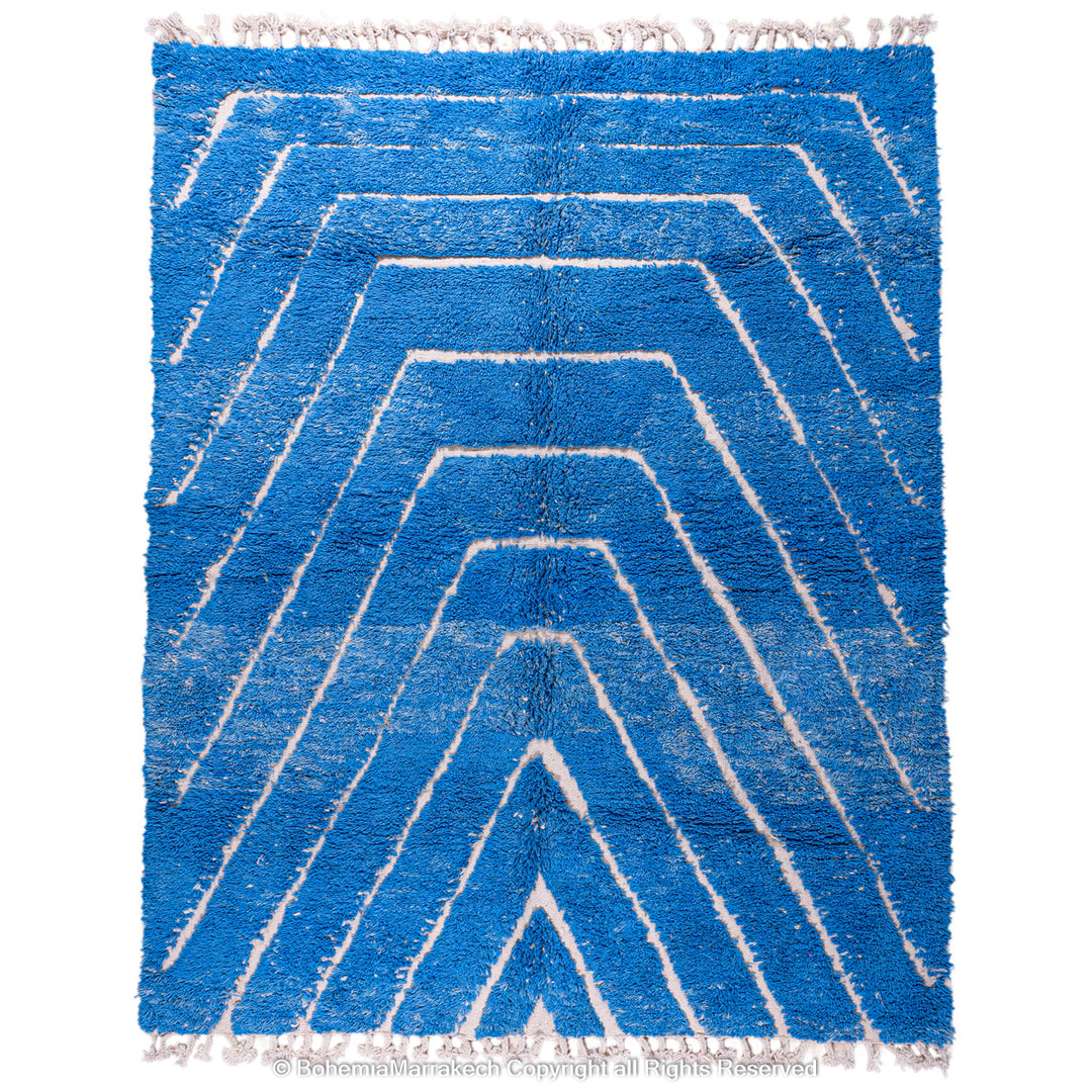 Multicolored Moroccan Boujaad Rug handmade with wool, featuring vibrant pink, yellow, and blue Berber patterns.