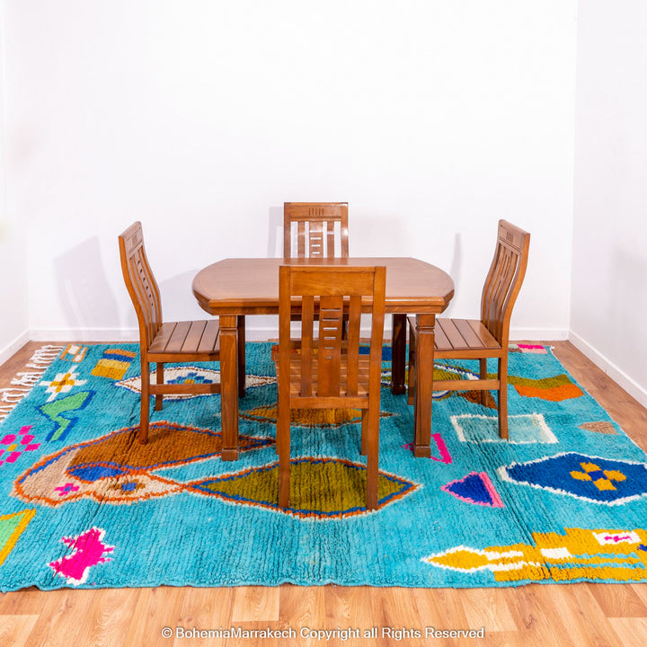 Blue Moroccan Boujaad rug with bold multicolor geometric Berber patterns, handmade in wool