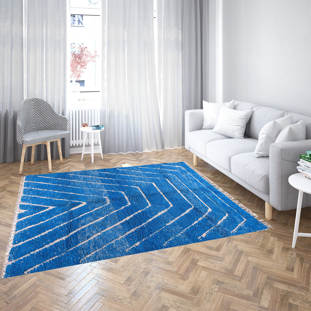 Multicolored Moroccan Boujaad Rug handmade with wool, featuring vibrant pink, yellow, and blue Berber patterns.