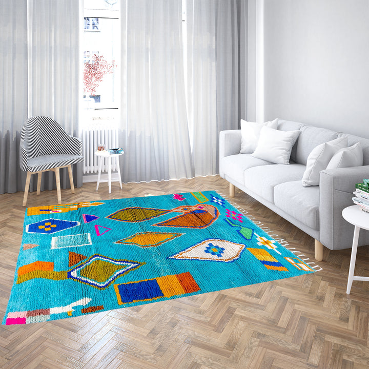 Blue Moroccan Boujaad rug with bold multicolor geometric Berber patterns, handmade in wool