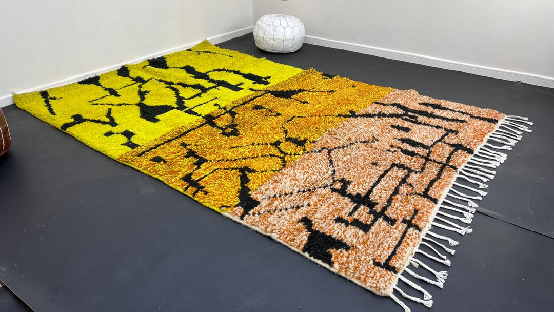 Yellow Moroccan wool rug with abstract Berber design and black line pattern