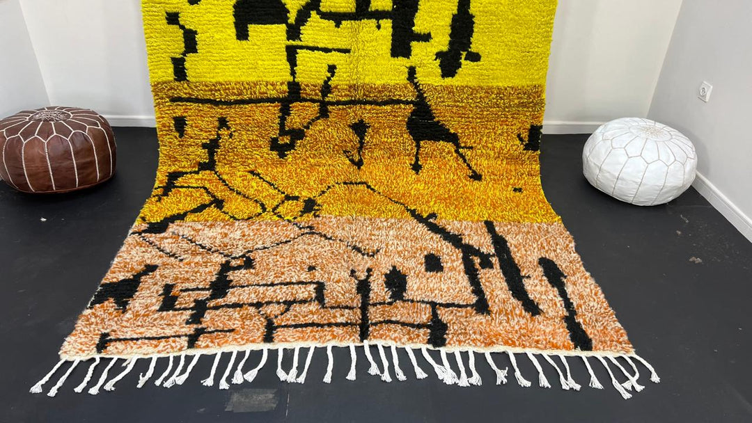 Yellow Moroccan wool rug with abstract Berber design and black line pattern