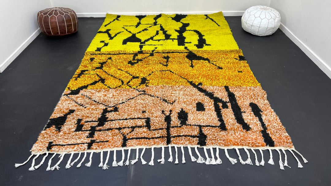 Yellow Moroccan wool rug with abstract Berber design and black line pattern