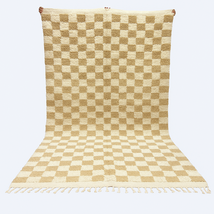 Handwoven beige and cream Moroccan wool rug with checkered design