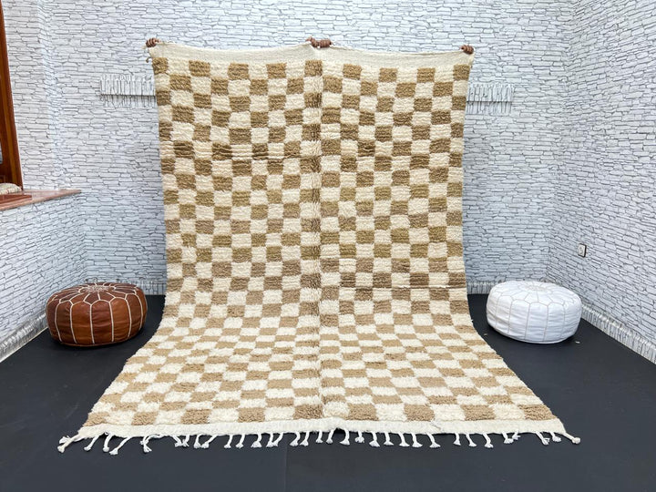 Handwoven beige and cream Moroccan wool rug with checkered design