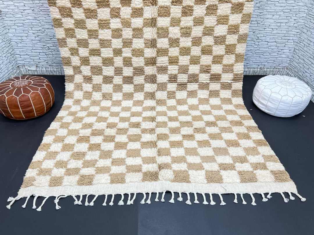 Handwoven beige and cream Moroccan wool rug with checkered design