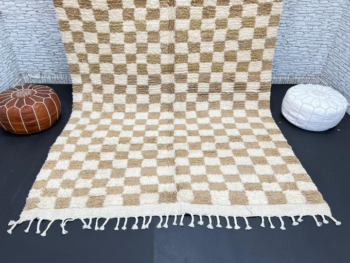 Handwoven beige and cream Moroccan wool rug with checkered design