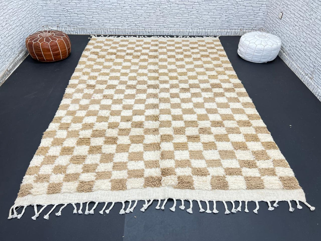 Handwoven beige and cream Moroccan wool rug with checkered design