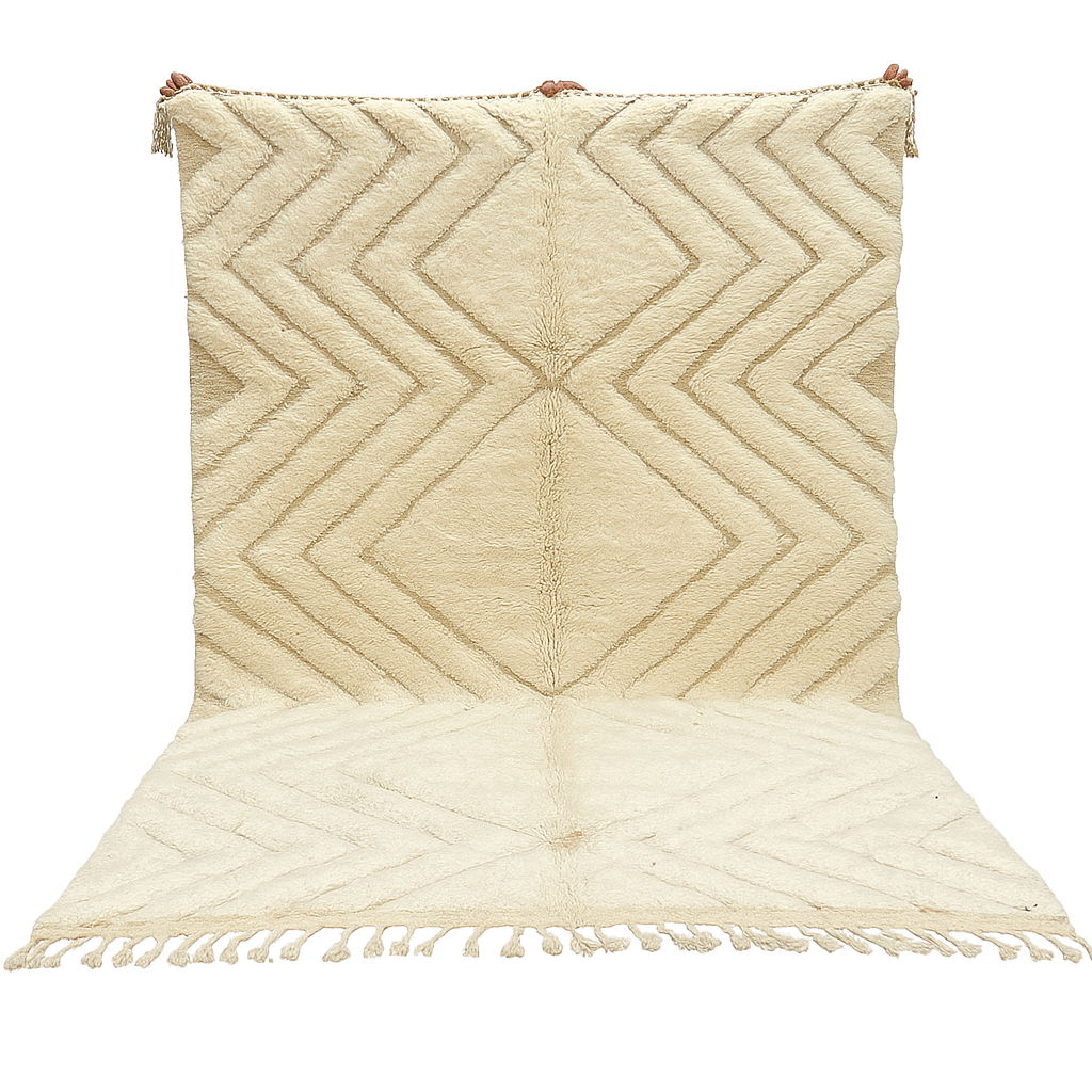 Handmade beige Moroccan wool rug with chevron geometric pattern, soft plush texture