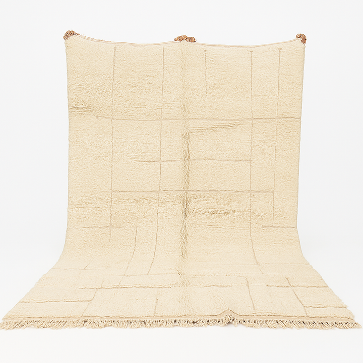 Handwoven beige Moroccan wool rug with shaved grid geometric pattern