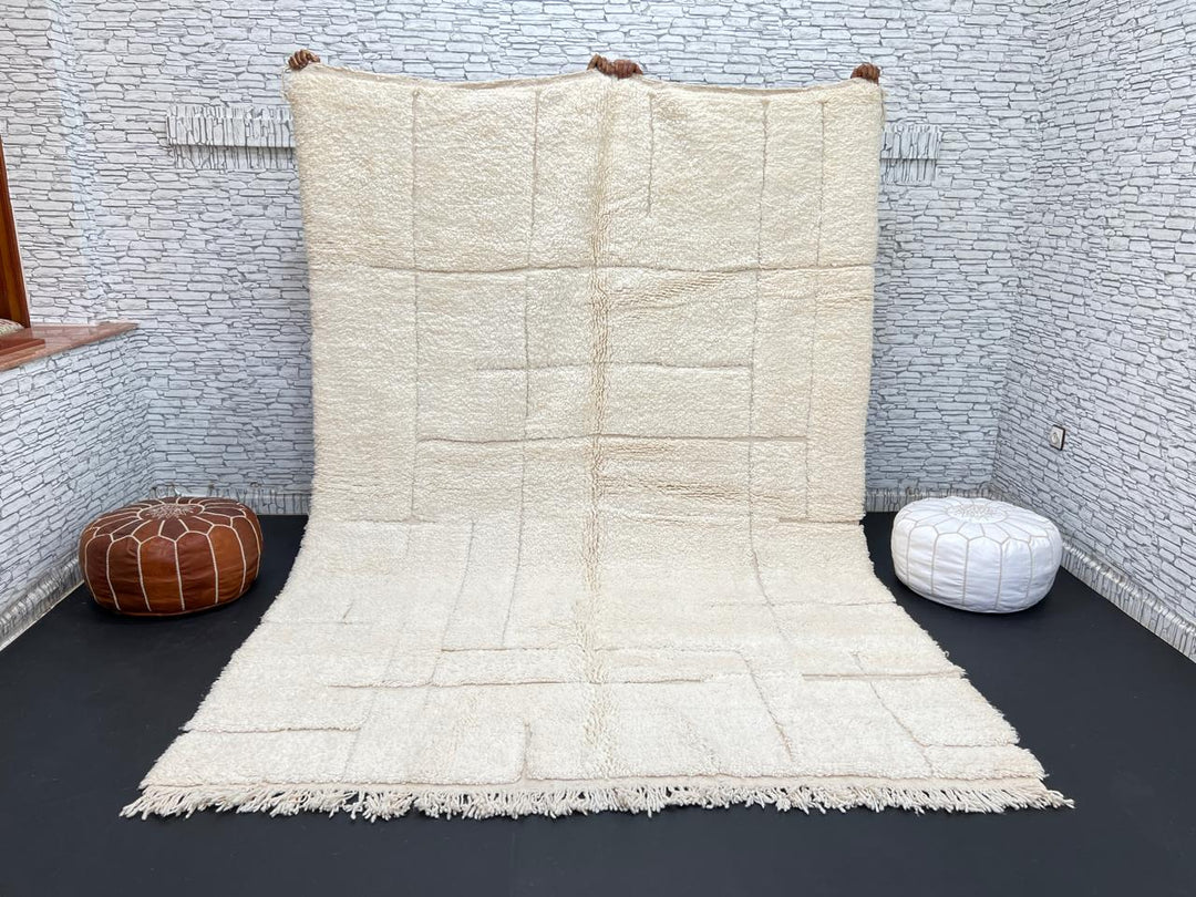 Handwoven beige Moroccan wool rug with shaved grid geometric pattern