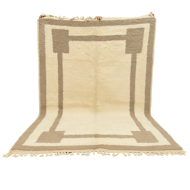 Beige minimalist Moroccan wool rug with geometric border pattern