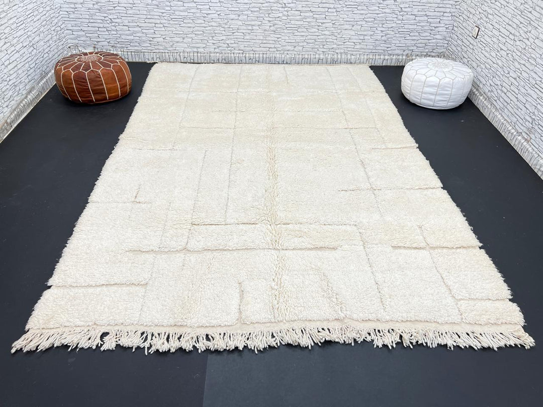 Handwoven beige Moroccan wool rug with shaved grid geometric pattern