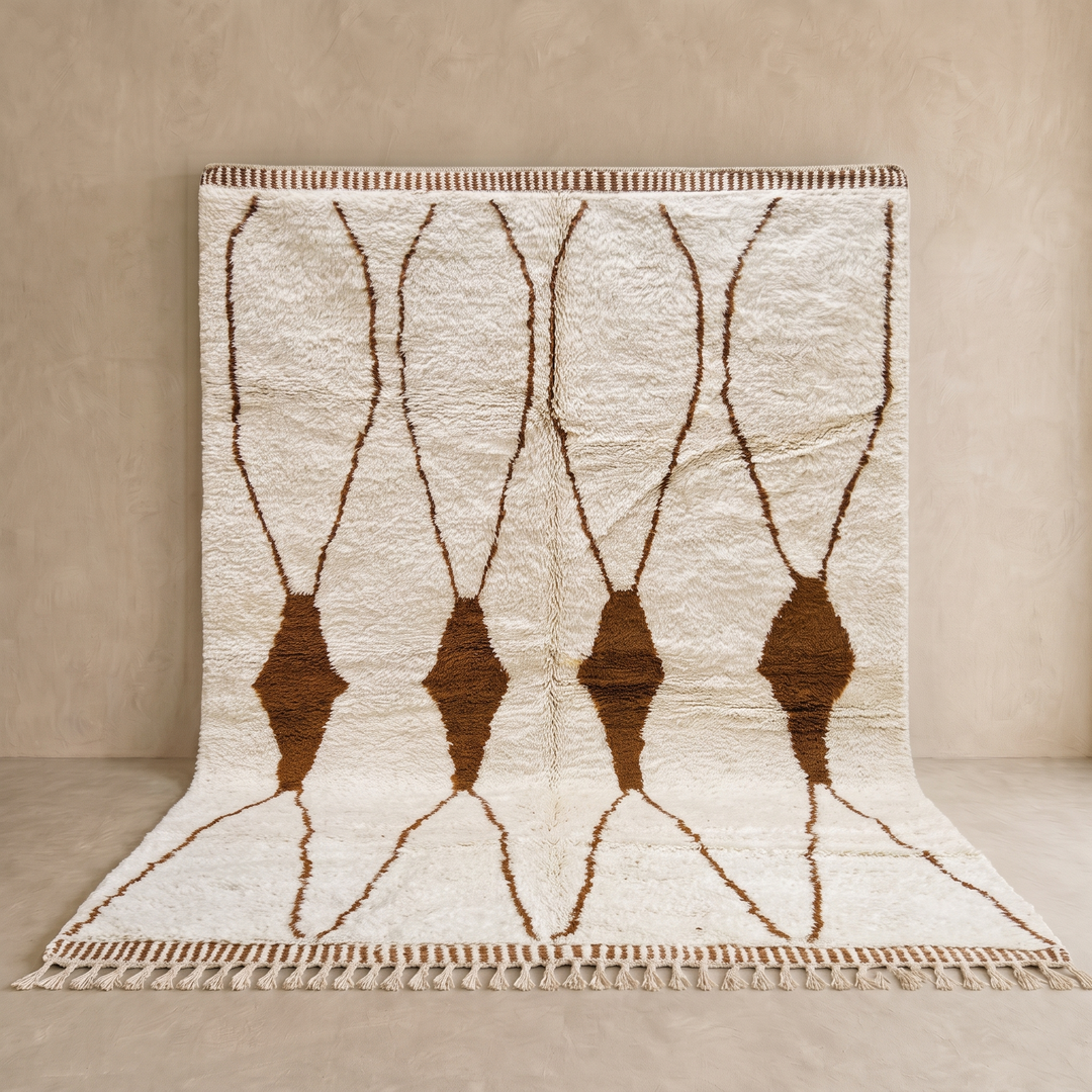 Beige and brown Moroccan wool rug with geometric design, handmade by Berber artisans using natural wool